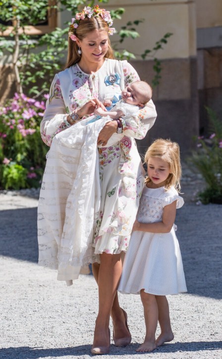 Princess Leonore walking next to her mum and baby sister