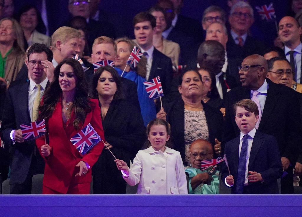 Catherine, Princess of Wales, Princess Charlotte of Wales and Prince George of Wales view the Coronation Concert from the Royal Box on May 7, 2023 in Windsor, England.