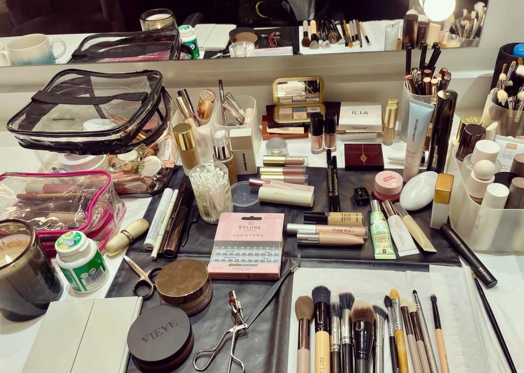The secret weapon - those eyelash curlers - can easily be spotted in Lindsay's photo of her makeup essentials