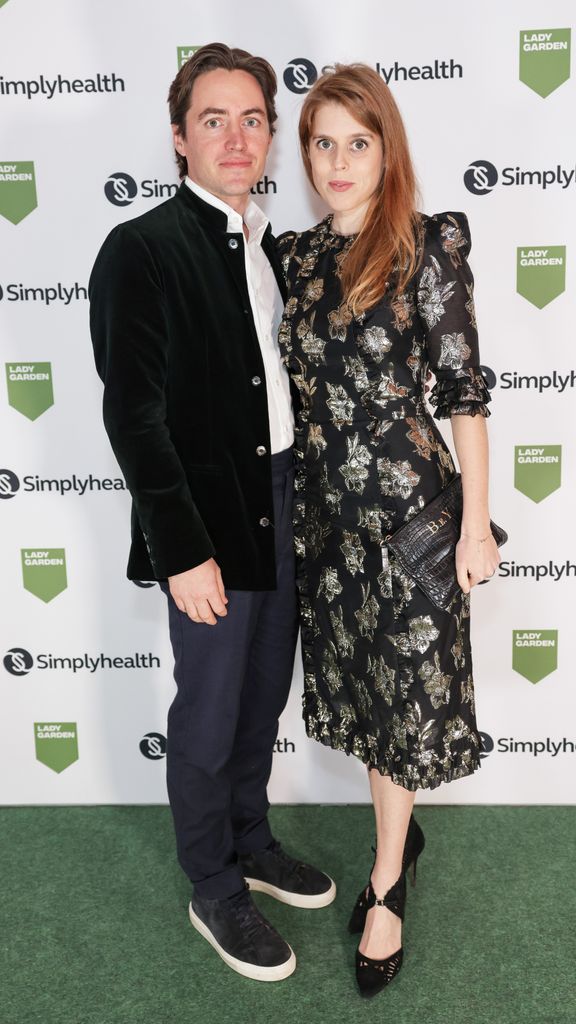 Princess Beatrice posed with husband in black and gold dress