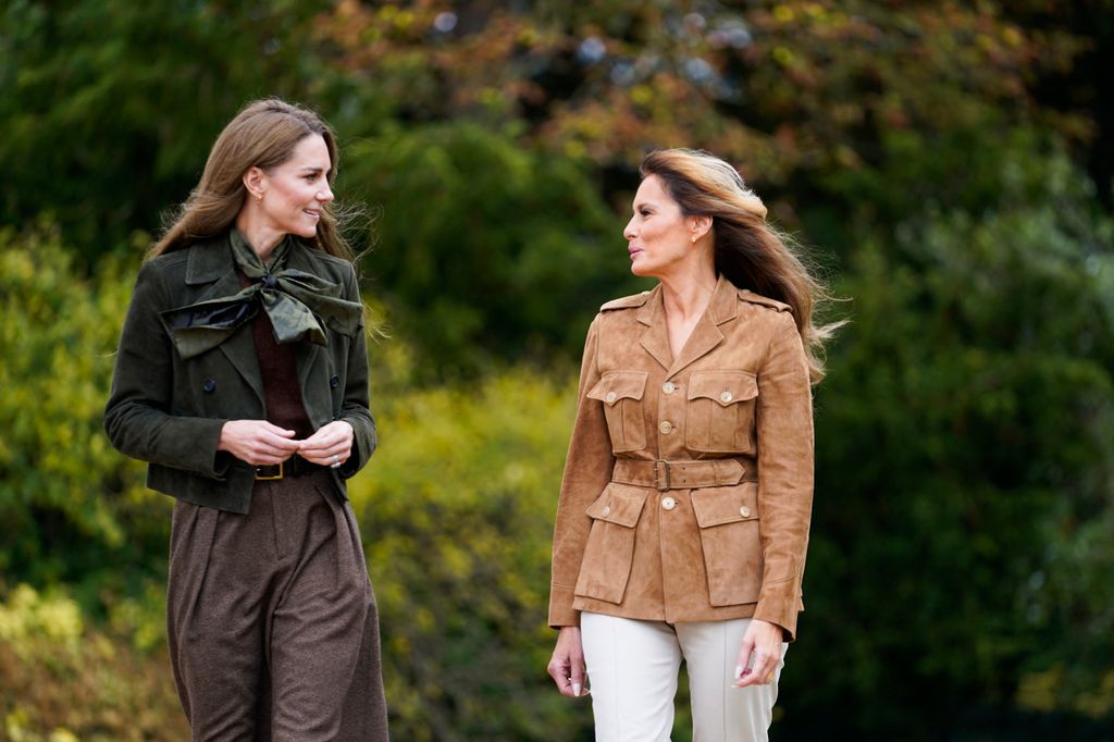 Britain's Catherine, Princess of Wales and US First Lady Melania Trump tour the gardens of visit Frogmore Cottage on the Windsor Estate