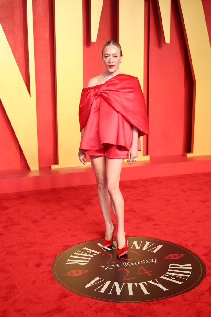 Chloe Sevigny in short red dress