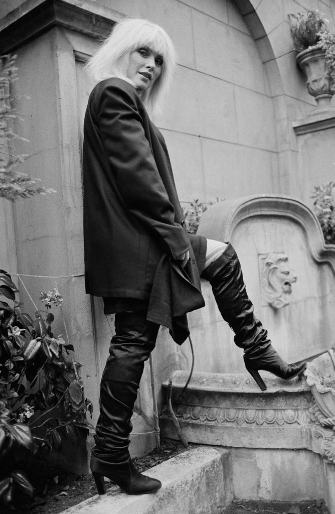 Debbie Harry wearing thigh-high boots 