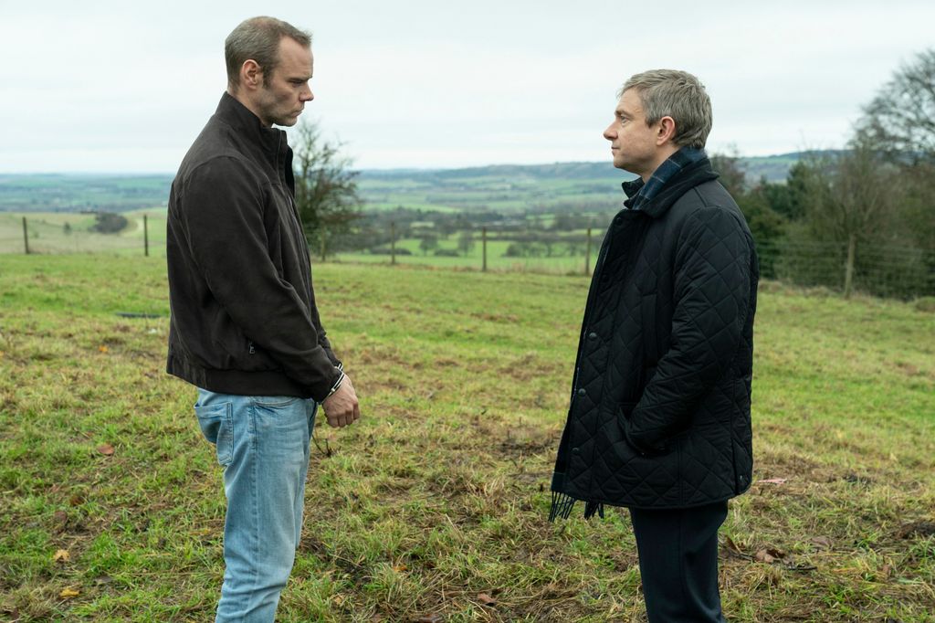 two men facing each other on fied