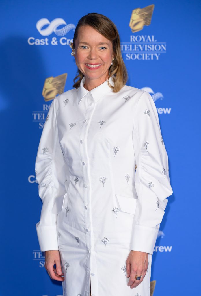 anna maxwell martin smiling in white dress 