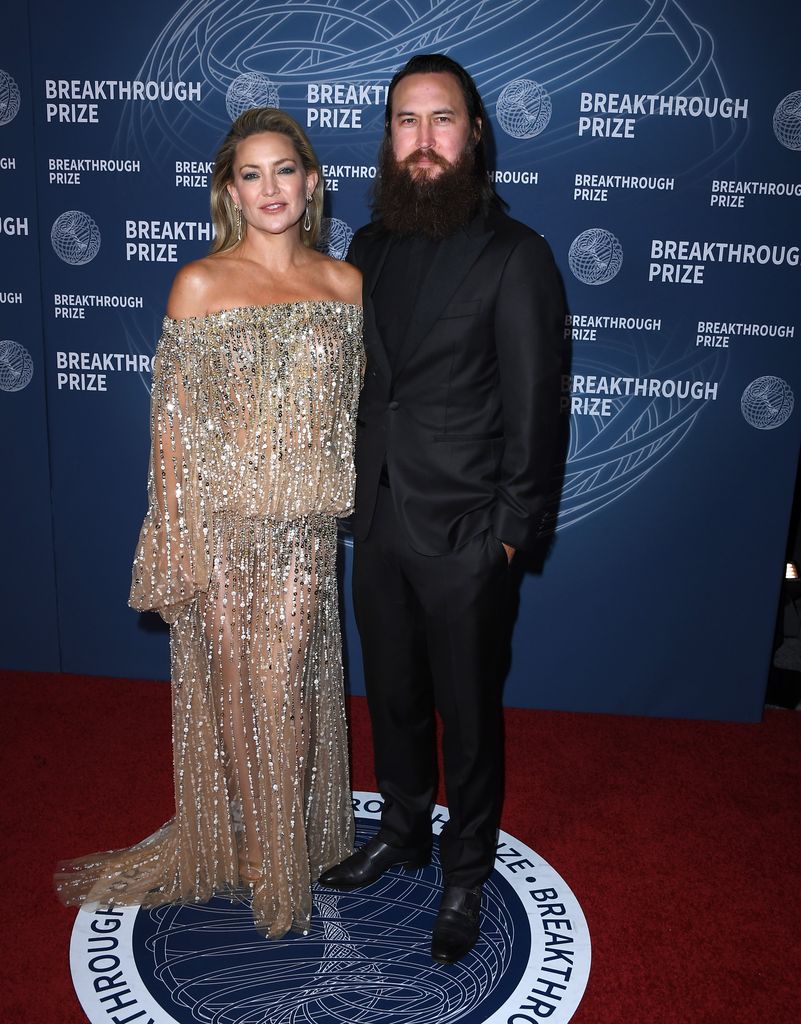 Kate Hudson, Danny Fujikawa arrives at the 11th Breakthrough Prize Ceremony at Barker Hangar on April 05, 2025 in Santa Monica, California