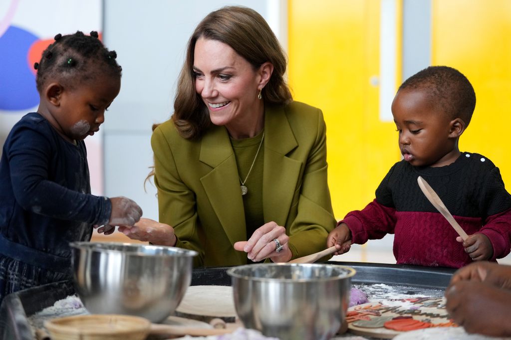 Kate playing with children at Home-Start Oxford