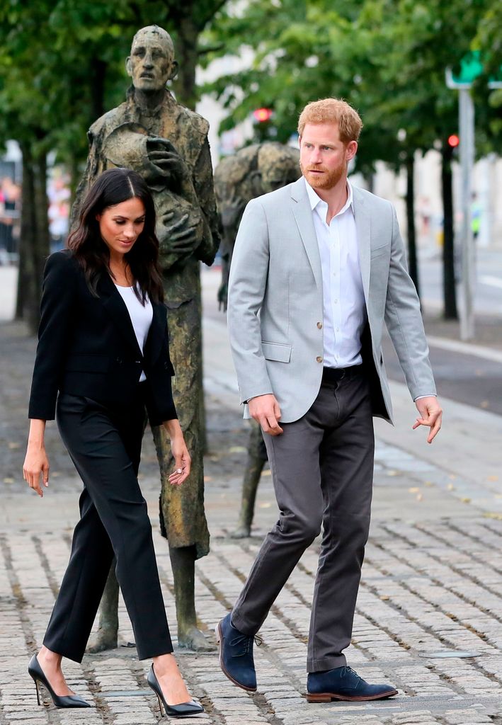 Prince Harry and wife Meghan visit Irish sculptor, Rowan Gillespie's Famine Memorial statues in Dublin on the final day of their two day visit on July 11, 2018