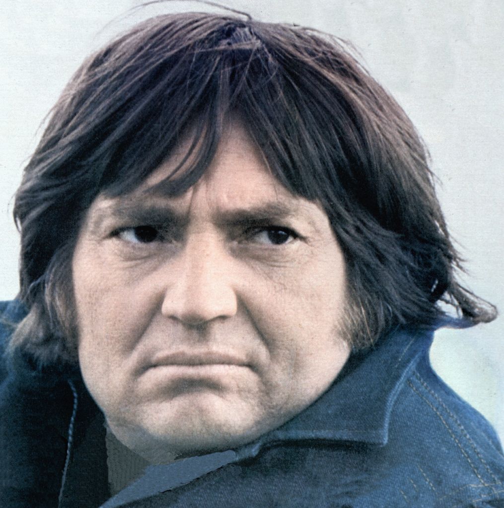 Willie before he grew his hair. Looking sullen, dark floppy bangs