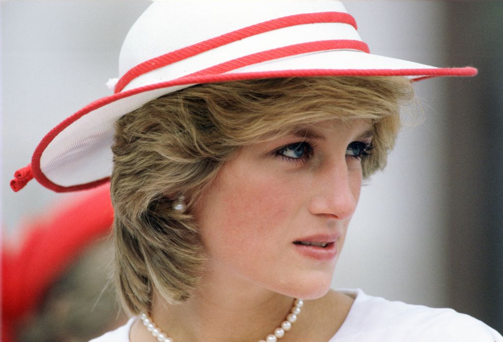 Diana, Princess of Wales looking to right in red and white hat