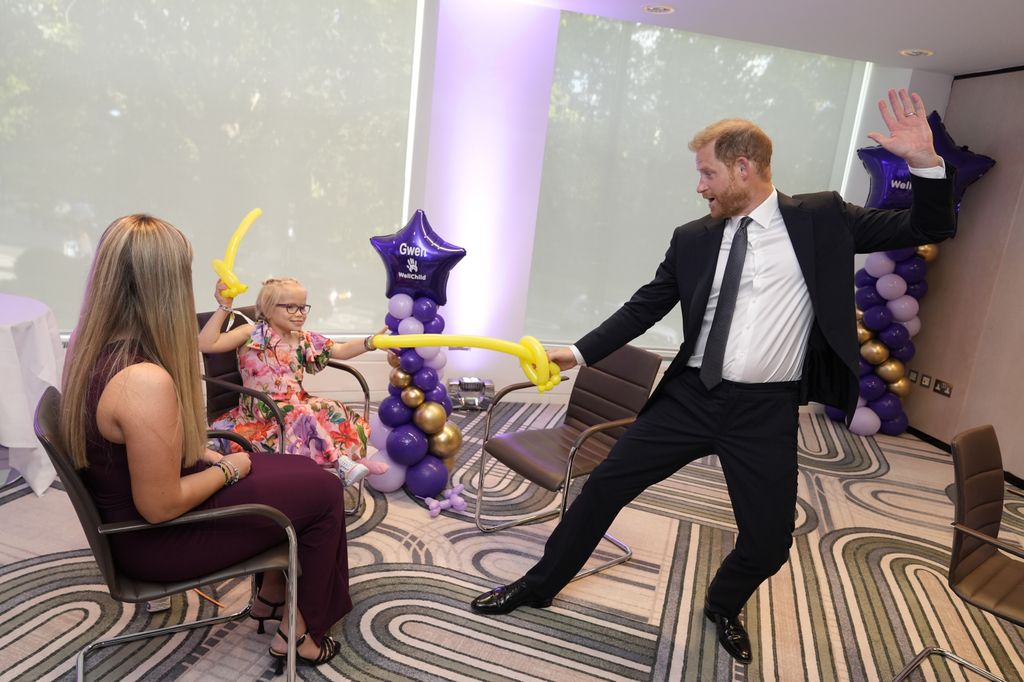 Harry and Gwen had a model balloon sword fight