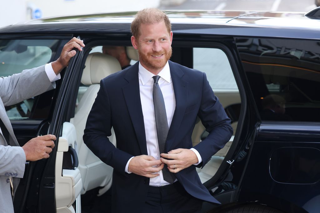 Harry donned a navy suit for the occasion