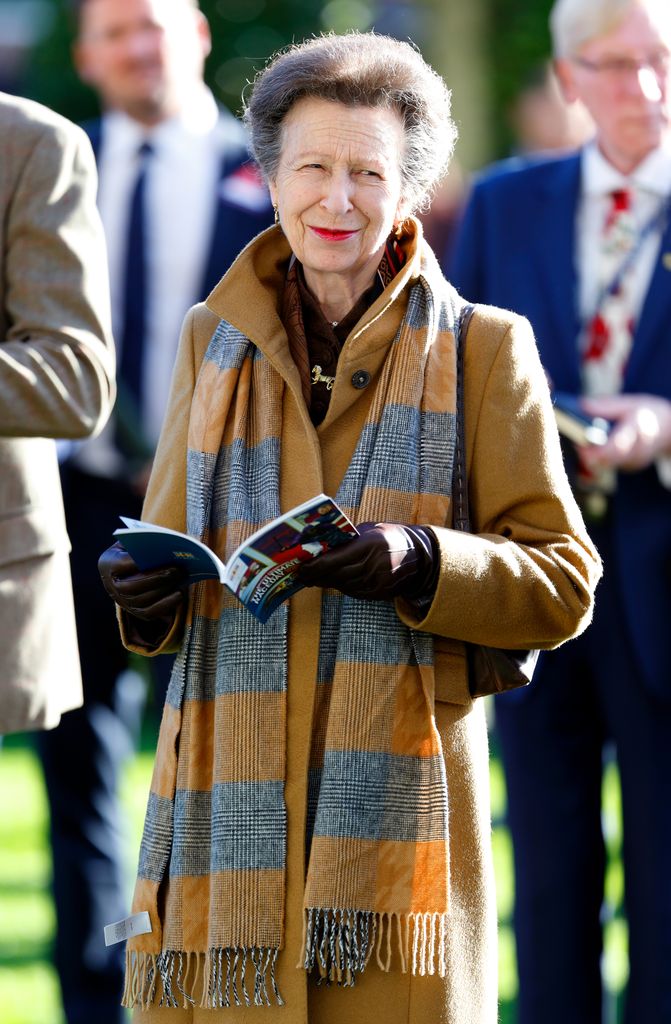 Princess Anne in Highgrove scarf and mustard coat
