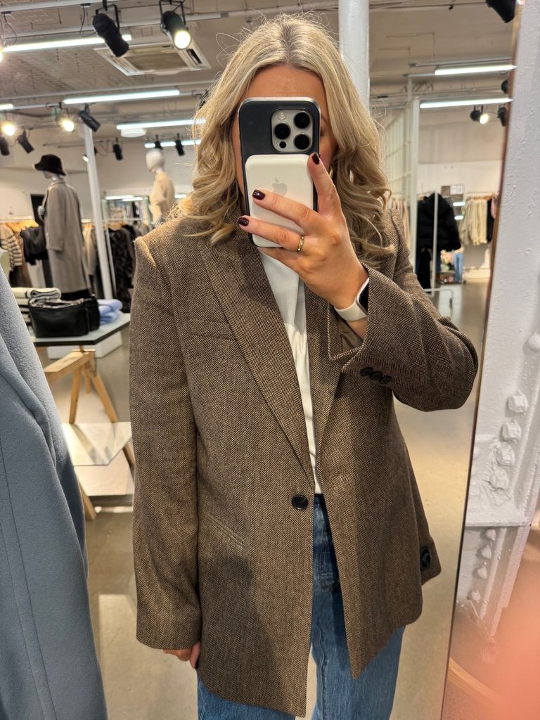 Writer Leanne Bayley wearing an & Other Stories blazer