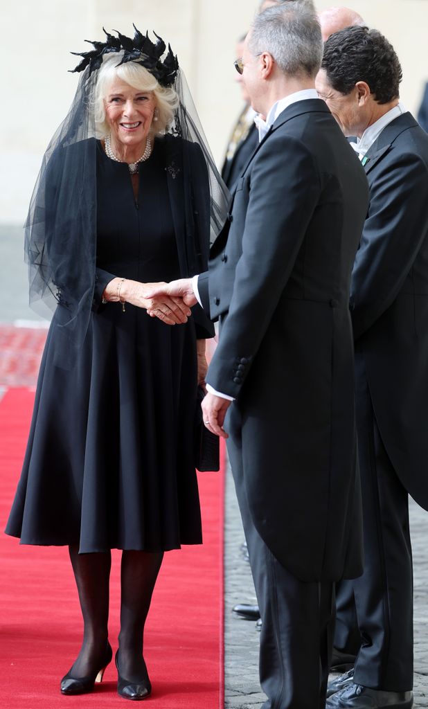 The Queen wore a black dress with a black veil