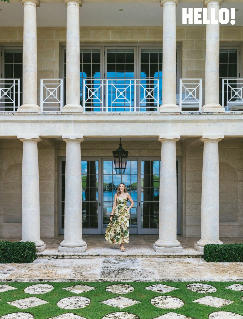 Dee posing out the Palm Beach Mansion