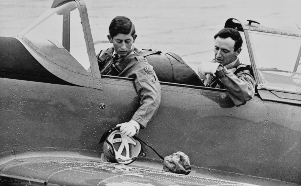 two men sat in plane
