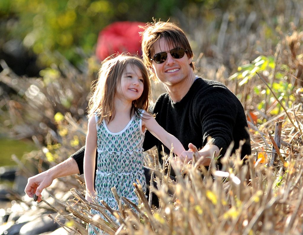 Suri Cruise smiling with her father Tom Cruise 