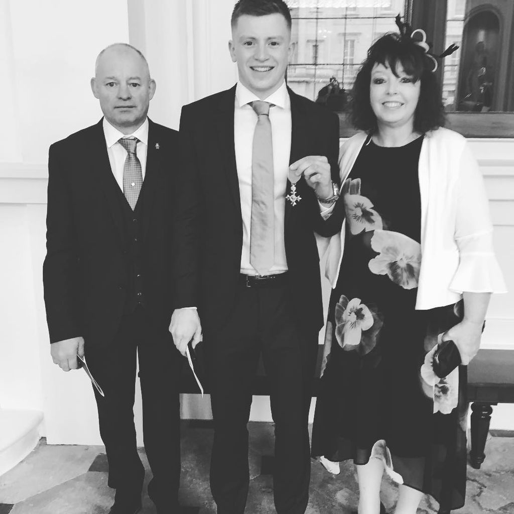 Adam Peaty with his parents