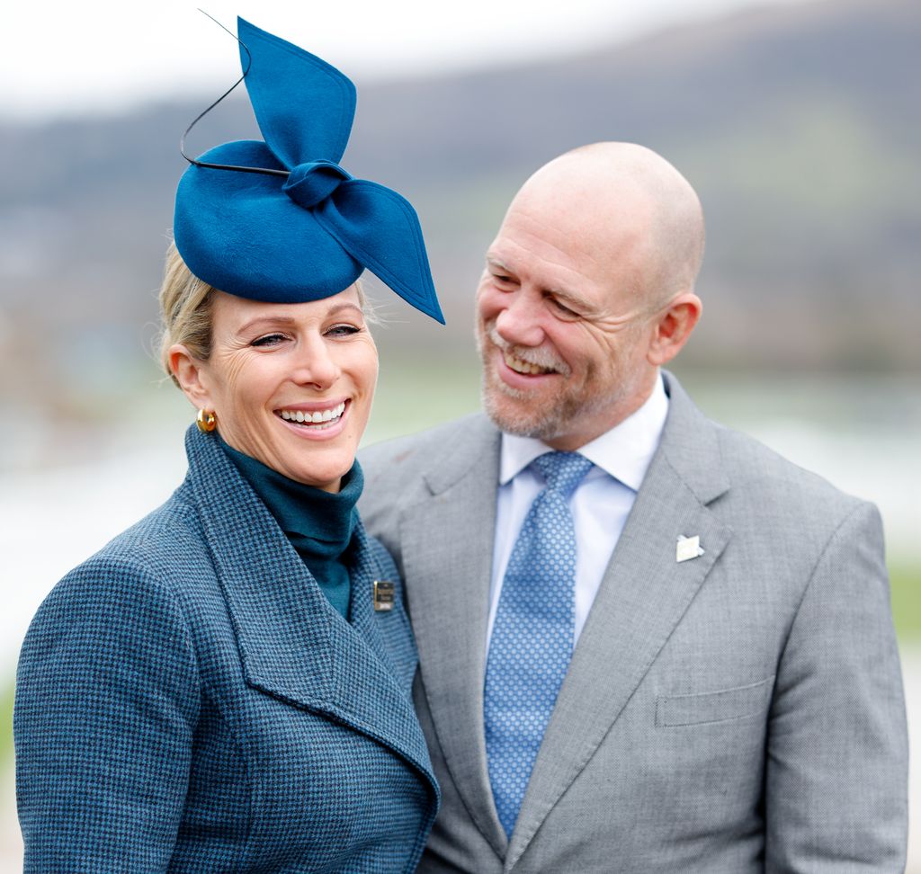 Mike and Zara Tindall smiling at Cheltenham Festival
