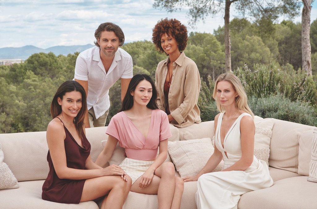 Group of people sat on sofa 