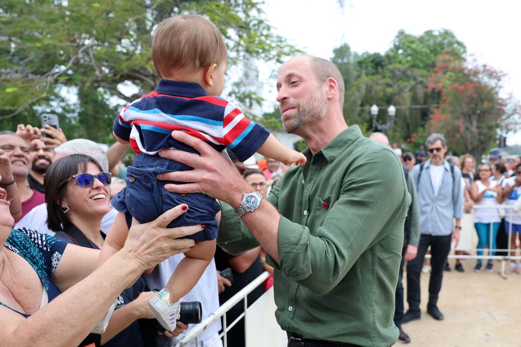 Joaquim’s cousin Andre Luis Junior said nobody asked William to hold the baby: "He just picked him up. It’s probably because he has three kids. He loves kids."