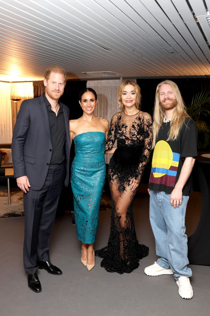 Prince Harry, Meghan, Duchess of Sussex, Rita Ora and Sam Ryder pose before the closing ceremony of the Invictus Games 