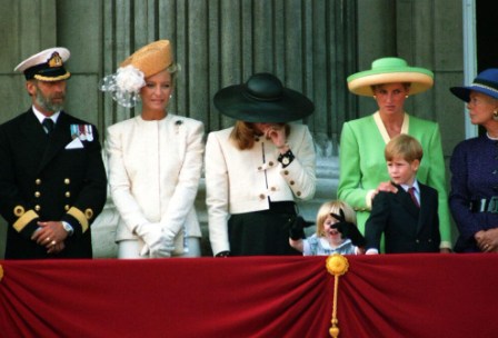 Princess Beatrice laughing at her mother's gloves on the balcony
