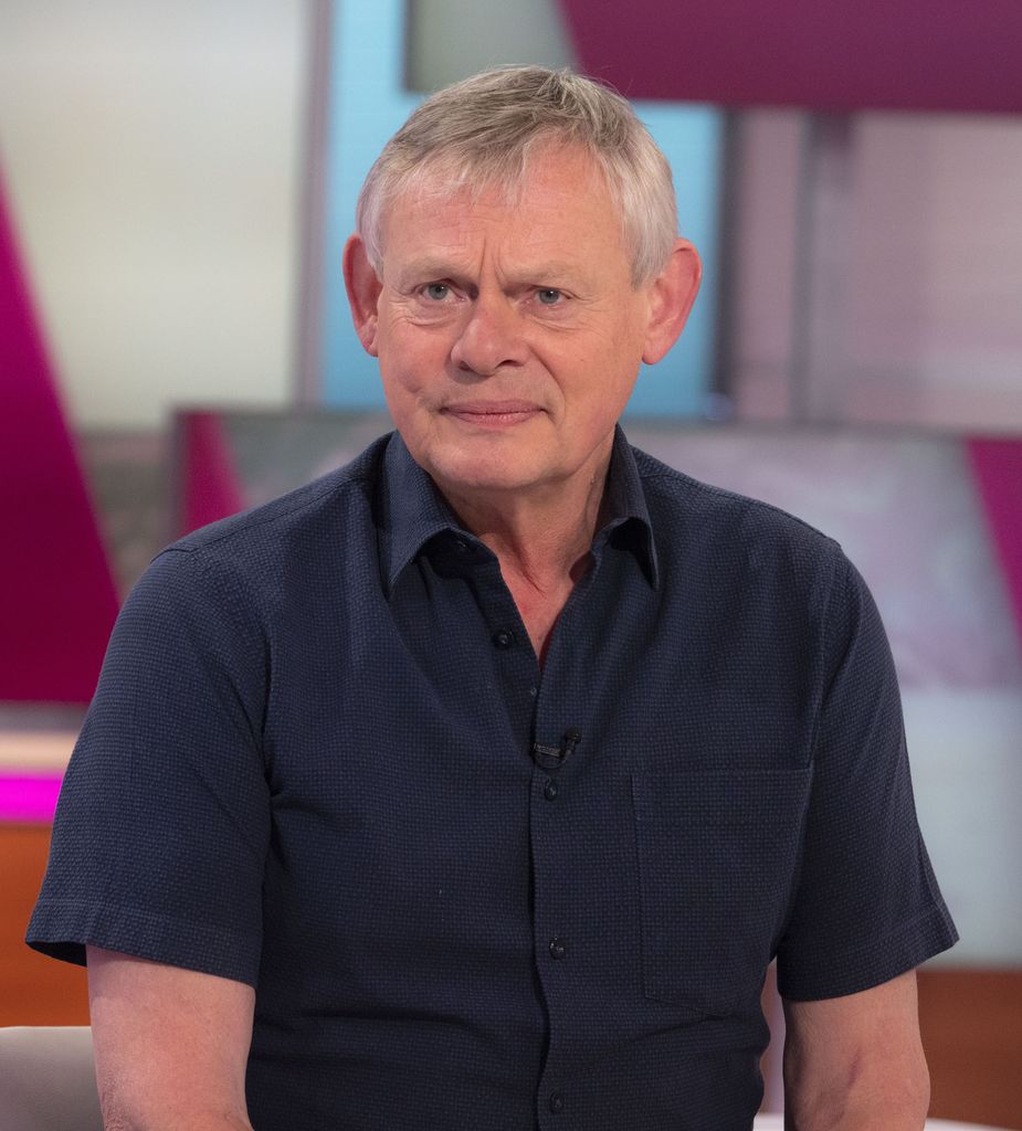 actor sitting in tv studio