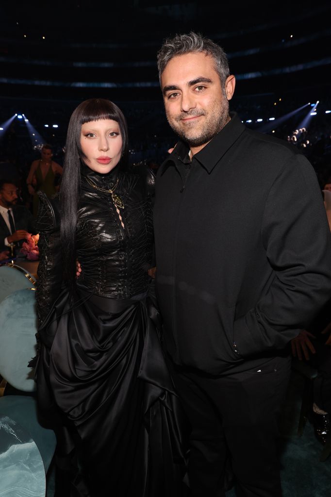Lady Gaga in black dress and Michael Polansky in black shirt attend the 67th Annual GRAMMY Awards on February 02, 2025 in Los Angeles, California