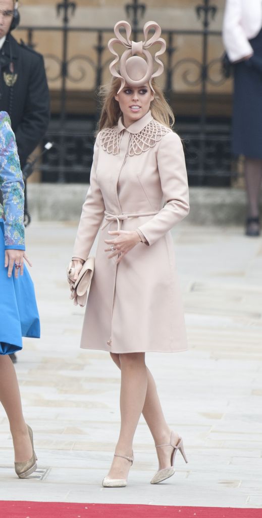 Princess Beatrice in nude dress with dramatic hat