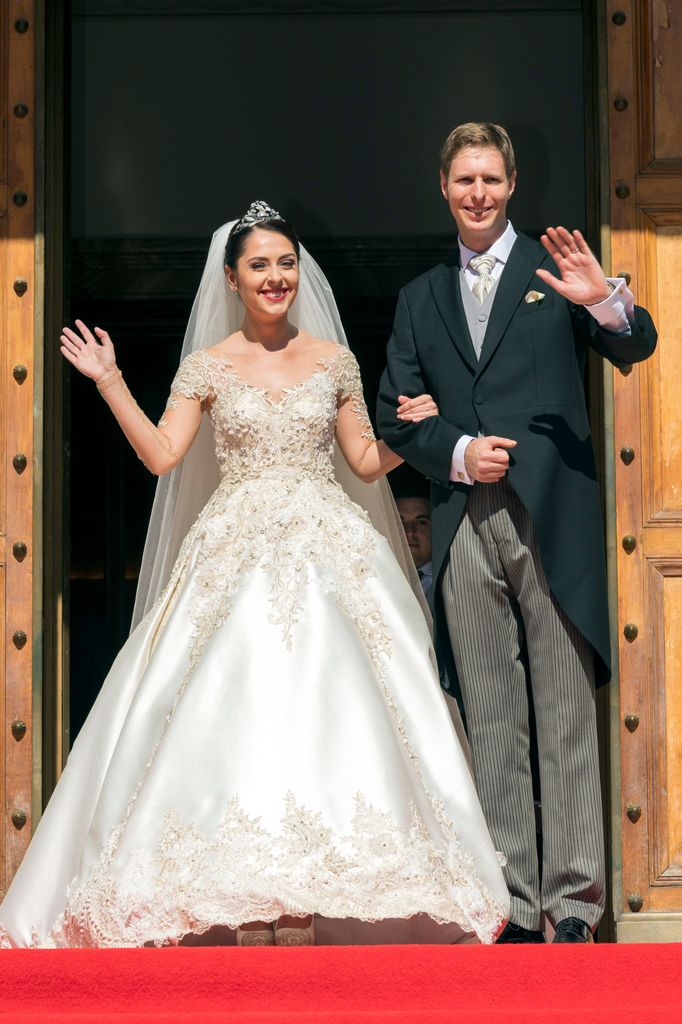 Crown Prince, Leka II of Albania and Elia Zaharia pose after the Wedding Ceremony of Elia Zaharia and Crown Prince, Leka II of Albania