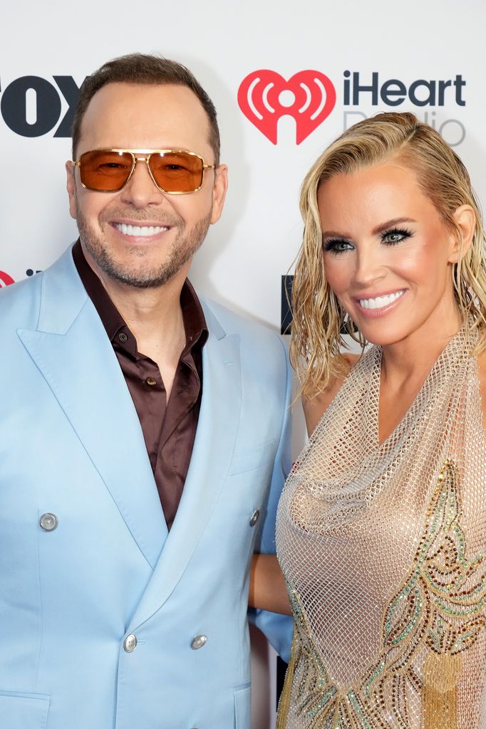 Donnie Wahlberg and Jenny McCarthy attend the 2025 iHeartRadio Music Awards at Dolby Theatre on March 17, 2025 in Hollywood, California