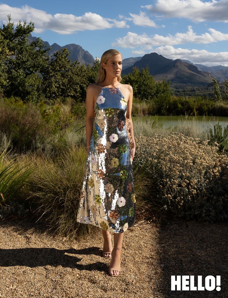 Eliza looks stunning in a Poetry dress and sandals by Saint Laurent