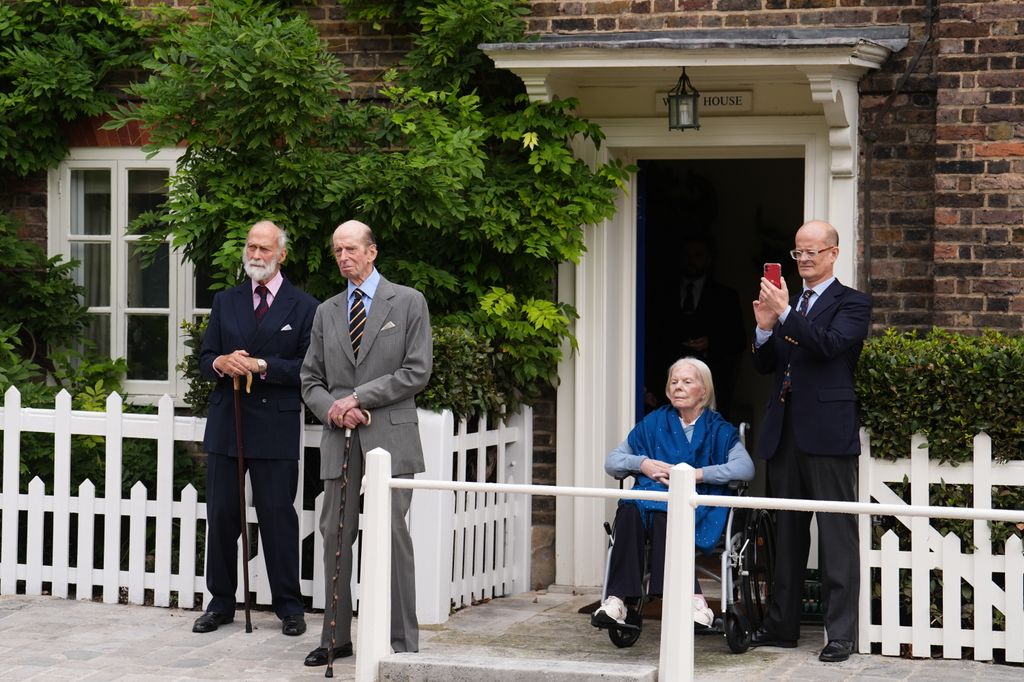 Prince Michael of Kent with the Duke of Kent and Duchess of Kent outside of a house