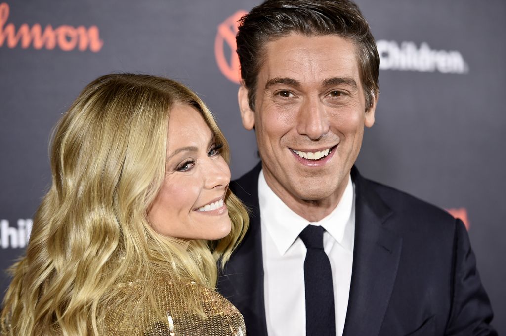 Anchorman/journalist David Muir and actress/TV Host Kelly Ripa attends the 6th Annual Save the Children Illumination Gala at the American Museum of Natural History in New York City on November 14, 2018.