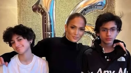 Jennifer Lopez with her arms around her twins Max and Emme