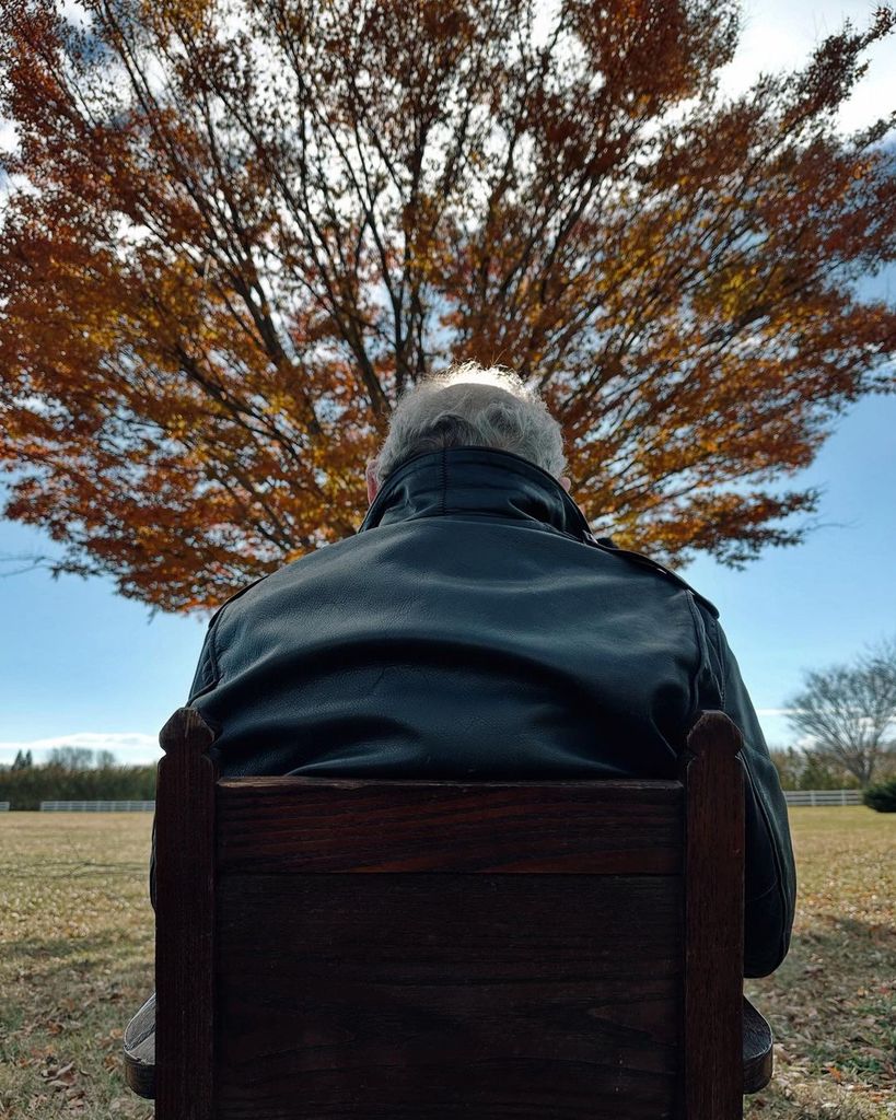 Madonna's father captured in front of a tree with the family's Thanksgiving portraits, shared on Instagram