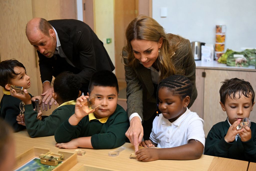 Britain's Prince William, Prince of Wales and Britain's Catherine, Princess of Wales meet children during a visit to the Natural History Museum's newly transformed gardens, in London, on September 4, 2025. (Photo by Eddie MULHOLLAND / POOL / AFP) (Photo by EDDIE MULHOLLAND/POOL/AFP via Getty Images)          