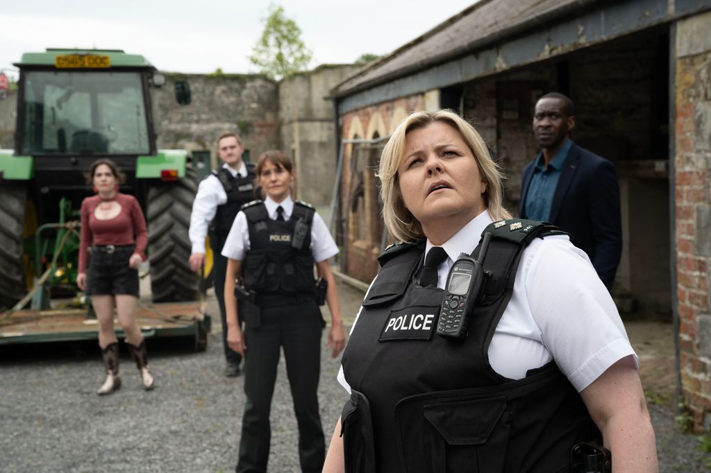 group of police officers at farm