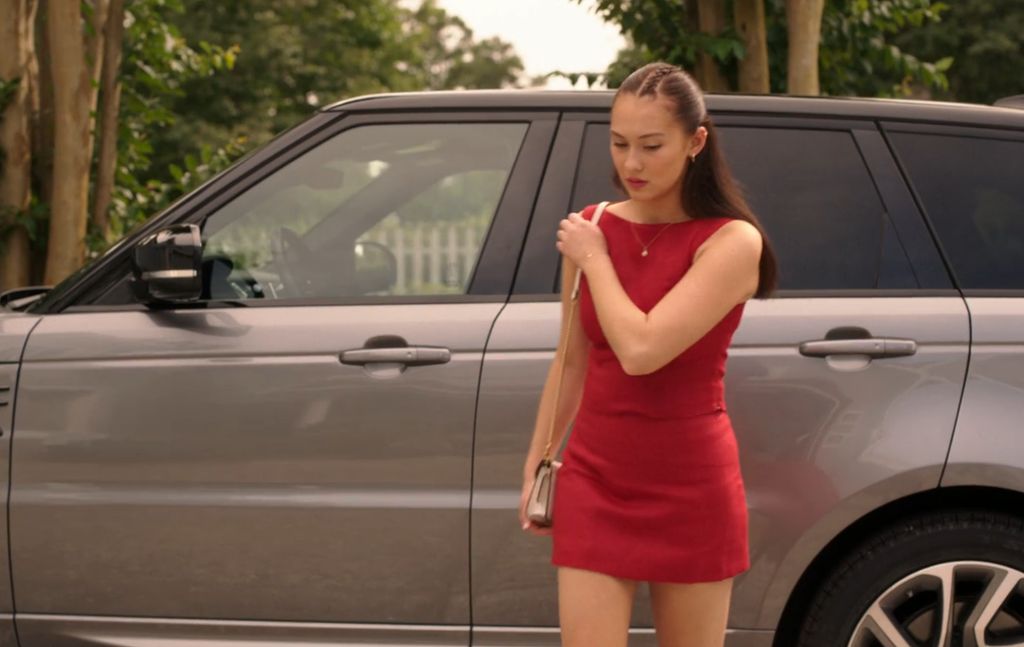 Belly red skirt and top at the country club