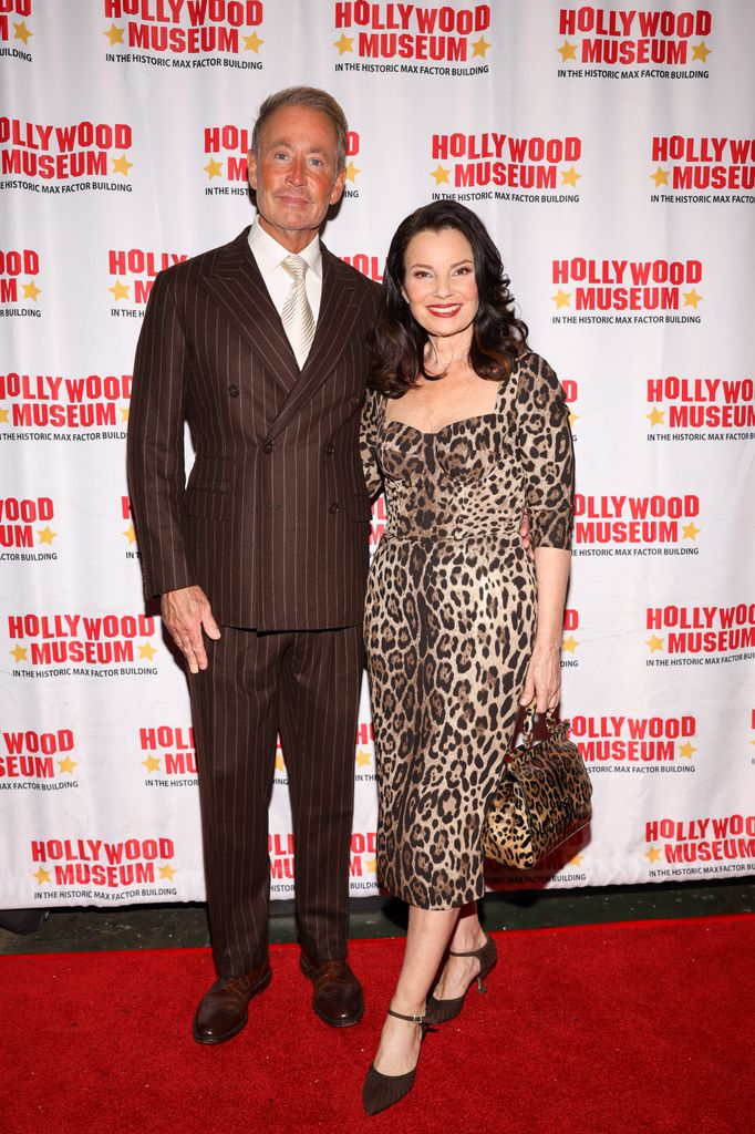 HOLLYWOOD, CALIFORNIA - SEPTEMBER 30: Peter Marc Jacobson and Fran Drescher attend the opening of the Hollywood Museum's new exhibit honoring Fran Drescher at The Hollywood Museum on September 30, 2025 in Hollywood, California. (Photo by Victoria Sirakova/Getty Images)