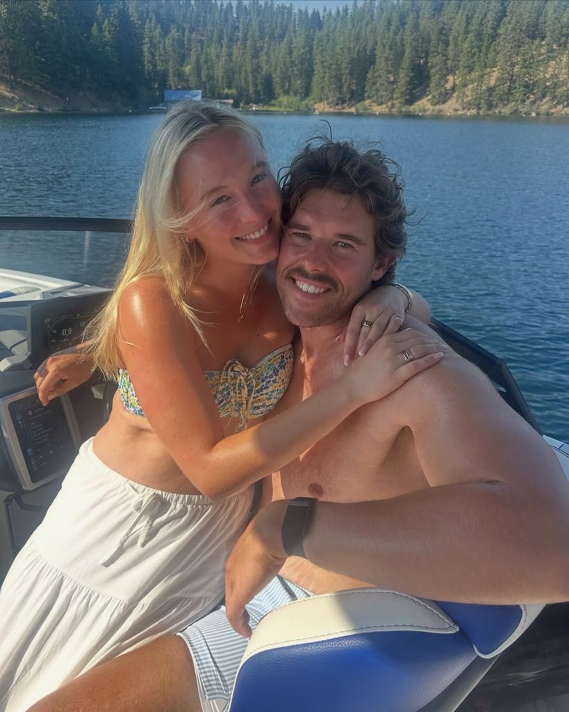 Christopher Schwarzenegger and a friend pose for a photo on the family's boat while out on the lake, shared on Instagram