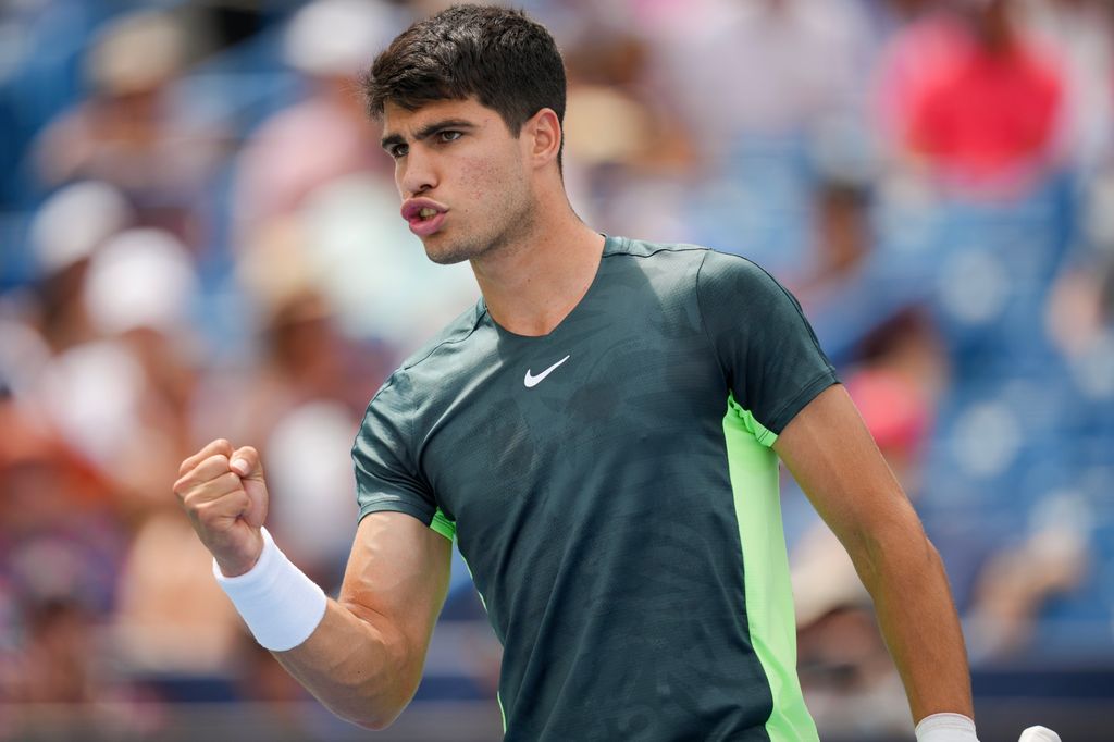 Carlos Alcaraz of Spain reacts after winning a point against Tommy Paul of the United States 