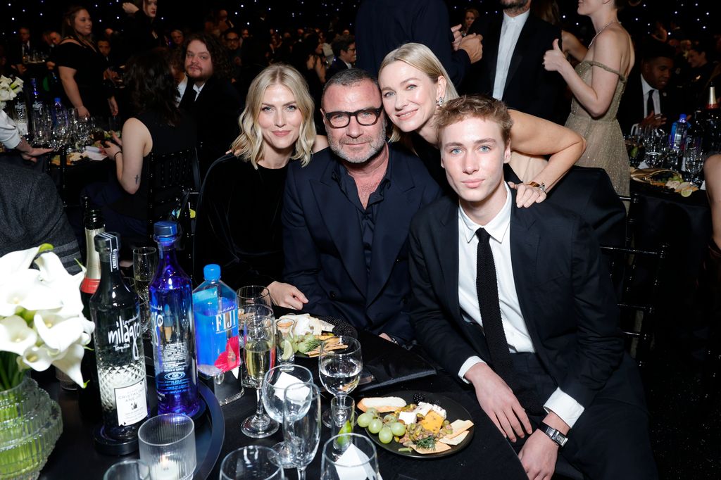 Taylor Neisen, Liev Schreiber, Naomi Watts, and Sasha Schreiber attend FIJI Water at The 30th Critics Choice Awards at Barker Hangar on February 07, 2025 in Santa Monica, California