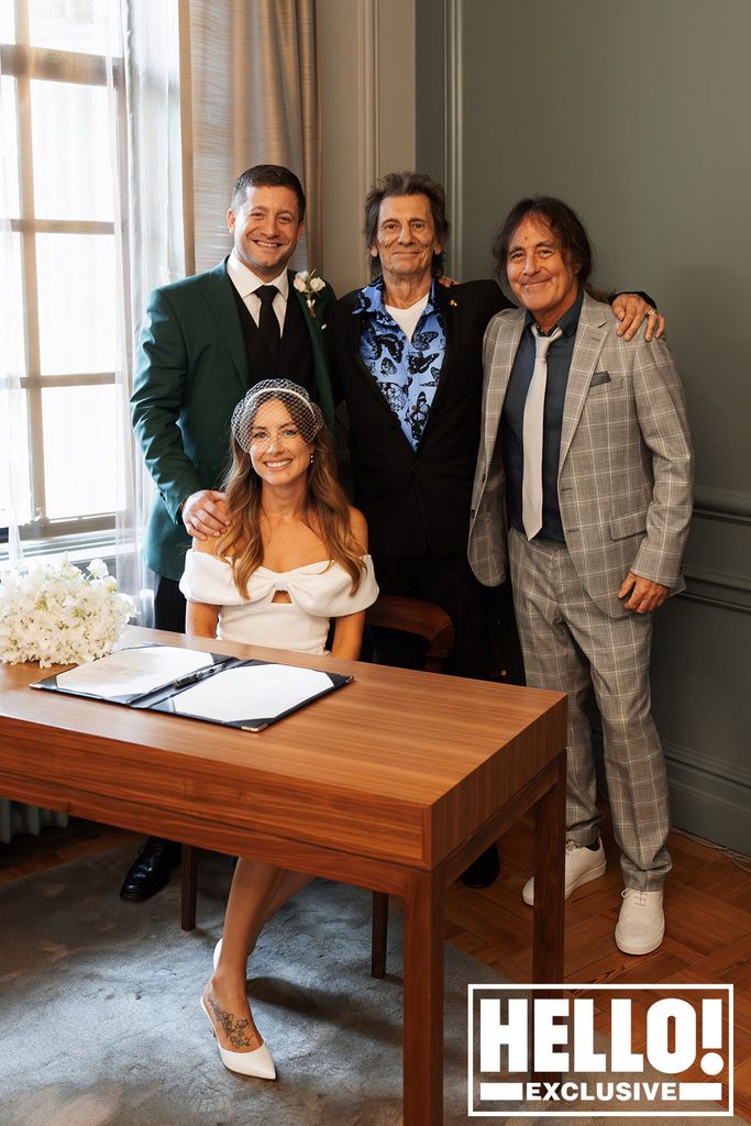 Ronnie Wood and Steve Harris with their children following the ceremony