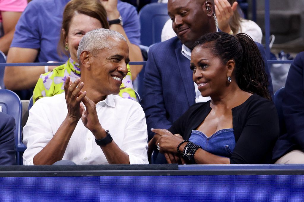 Former President of the United States Barack Obama and former First Lady Michelle Obama attend the men's singles first round match between Novak Djokovic of Serbia and Alexandre Muller of France during day one of the 2023 US Open at Arthur Ashe Stadium at the USTA Billie Jean King National Tennis Center on August 28, 2023 in the Flushing neighborhood of the Queens borough of New York City