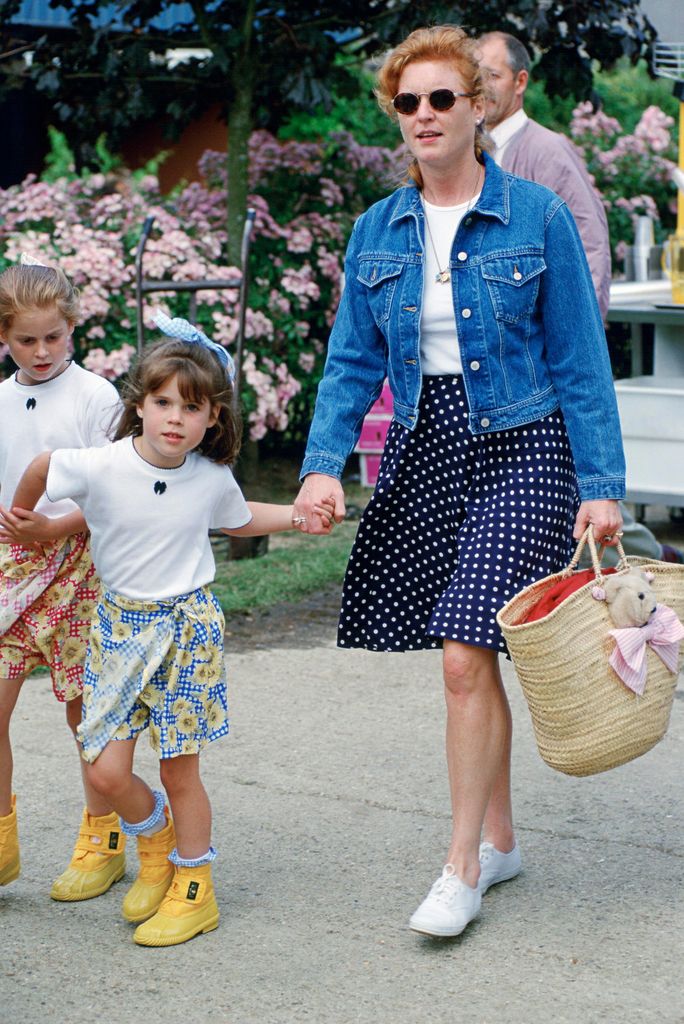 A photo fo Princess Beatrice and Eugnie as children with Sarah Ferguson