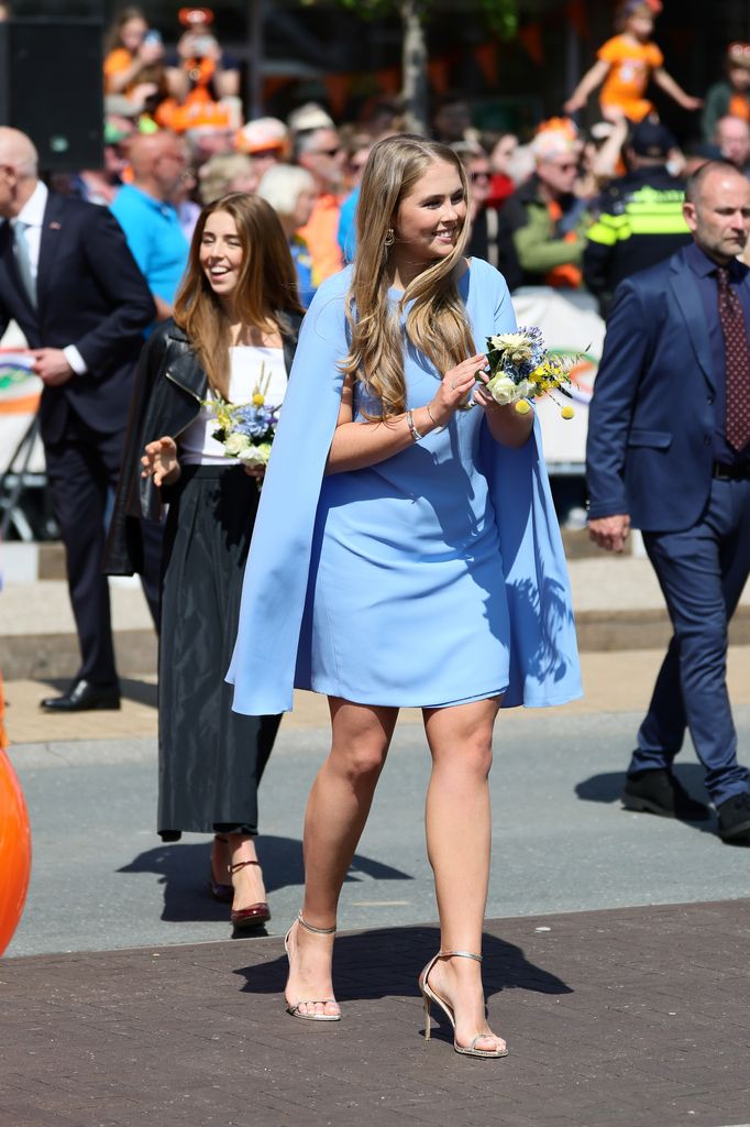 Princess Catharina-Amalia walking in a blue mini dress