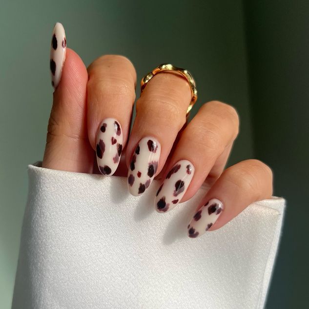 brown animal print nail manicure